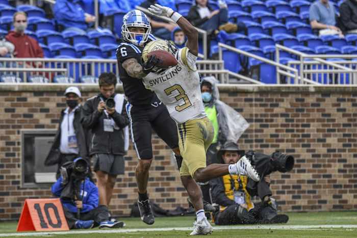 Oct 9, 2021; Duke receiver Eli Pancol (6) reaches for a pass against Georgia Tech Yellow Jackets defensive back Tre Swilling (3). Mandatory Credit: William Howard-USA TODAY Sports